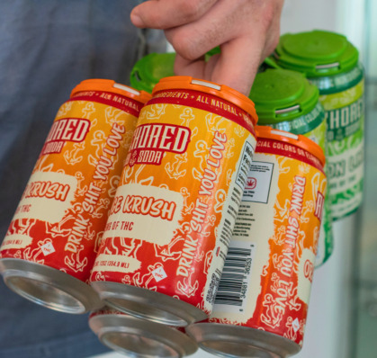 Homepage 14 Customer carrying Anchored THC Sodas