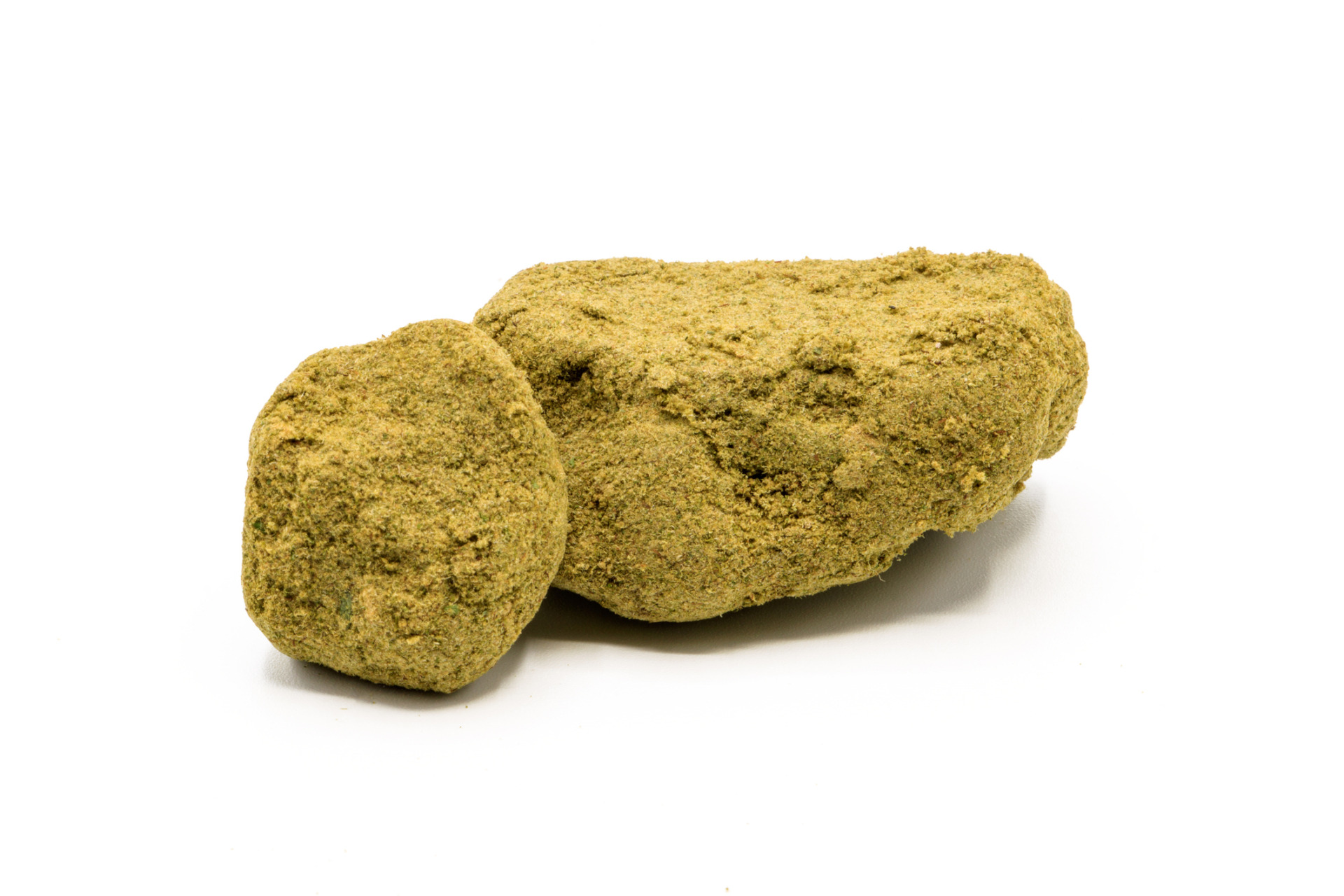 Two THCA marijuana moon rocks against a plain white background